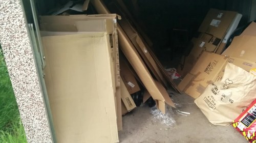 Documentation and insurance policy files for an insured rubbish removal company